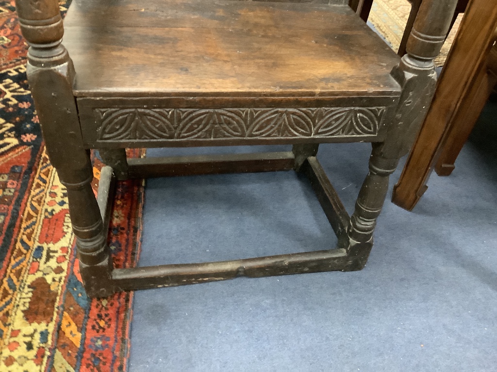 An oak Wainscot chair, width 59cm, depth 50cm, height 86cm